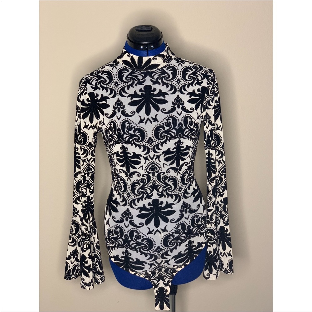 Bell wrist cream and black velvet design body suit